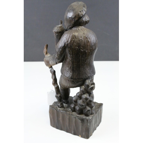 119 - Black Forest Style Carved Wooden Man holding a Beer Stein and Walking Stick, 28cms high