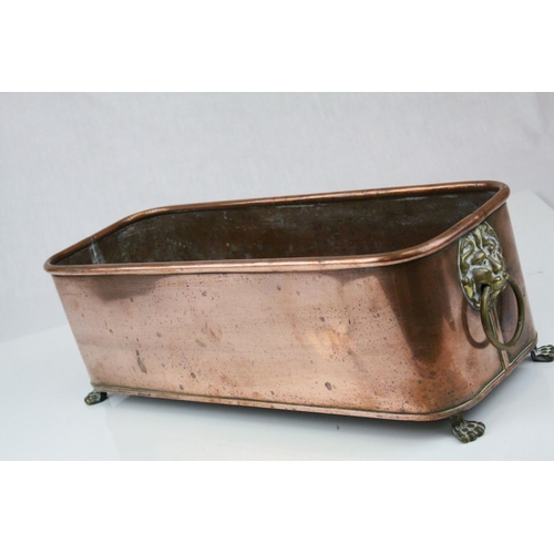 61 - Copper Rectangular Planter with Brass Ring Lion Mask Handles and Brass Paw Feet, 37cms long