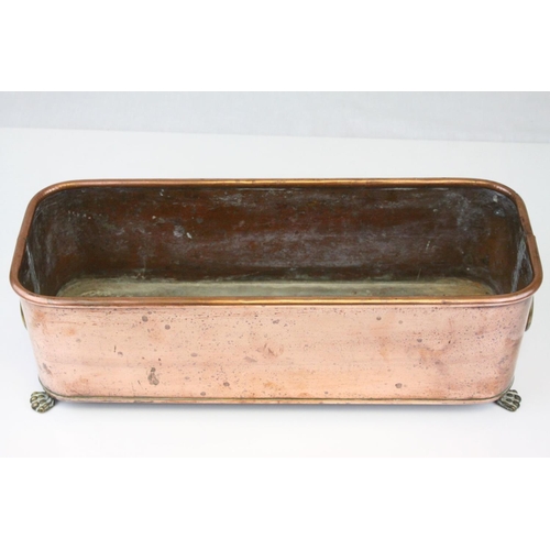 61 - Copper Rectangular Planter with Brass Ring Lion Mask Handles and Brass Paw Feet, 37cms long