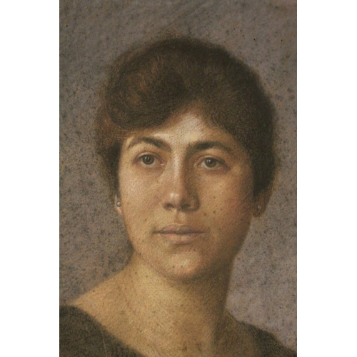 63 - Early 20th century Pastel Three-Quarter Length Portrait of a Seated Lady, indistinctly signed and da... 