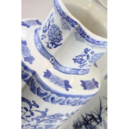 73 - Two Large 20th century Oriental Blue and White Vases, the largest 66cms high