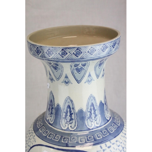 73 - Two Large 20th century Oriental Blue and White Vases, the largest 66cms high