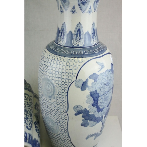73 - Two Large 20th century Oriental Blue and White Vases, the largest 66cms high
