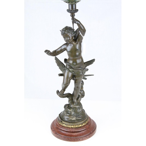 77 - Late 19th century Bronzed Spelter Oil Lamp, the column in the form of a Cherub holding the floral pa... 