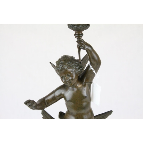 77 - Late 19th century Bronzed Spelter Oil Lamp, the column in the form of a Cherub holding the floral pa... 