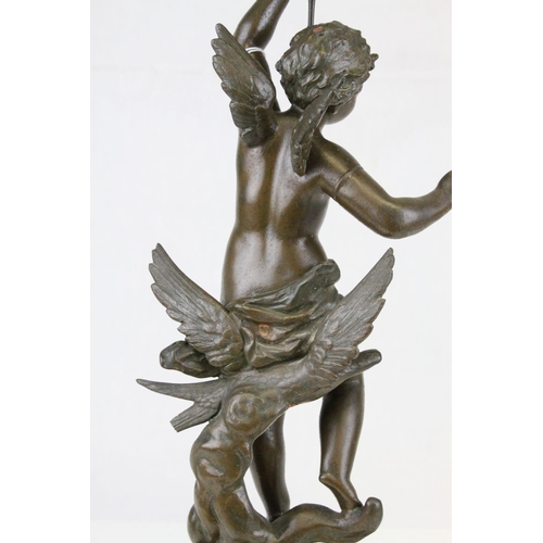 77 - Late 19th century Bronzed Spelter Oil Lamp, the column in the form of a Cherub holding the floral pa... 