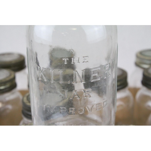 79 - Twelve Mid 20th century Kilner Jars with screw-on lids, 18cms high