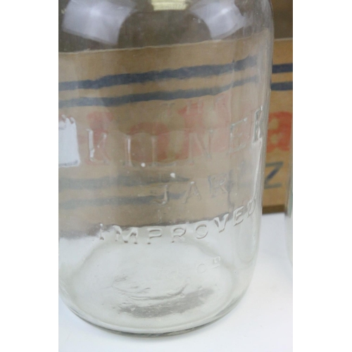 79 - Twelve Mid 20th century Kilner Jars with screw-on lids, 18cms high