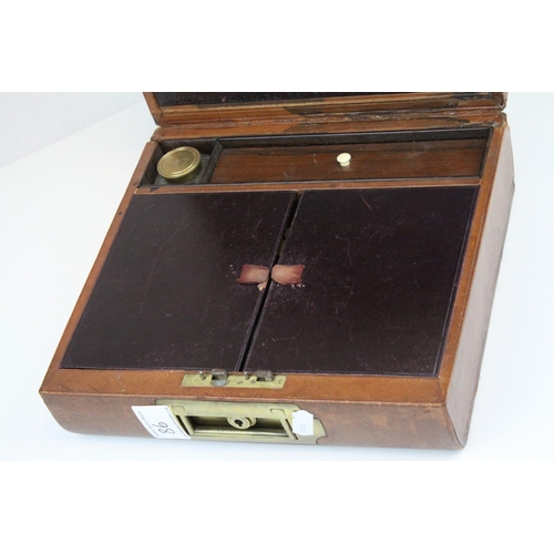 86 - Victorian Leather Covered Gentleman's Travelling Writing / Vanity Case, the hinged lid opening to re... 