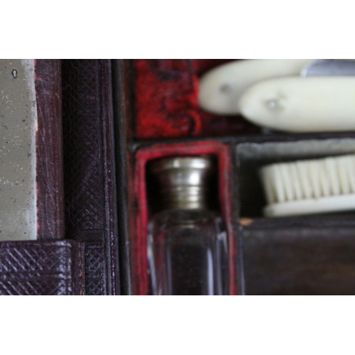 86 - Victorian Leather Covered Gentleman's Travelling Writing / Vanity Case, the hinged lid opening to re... 