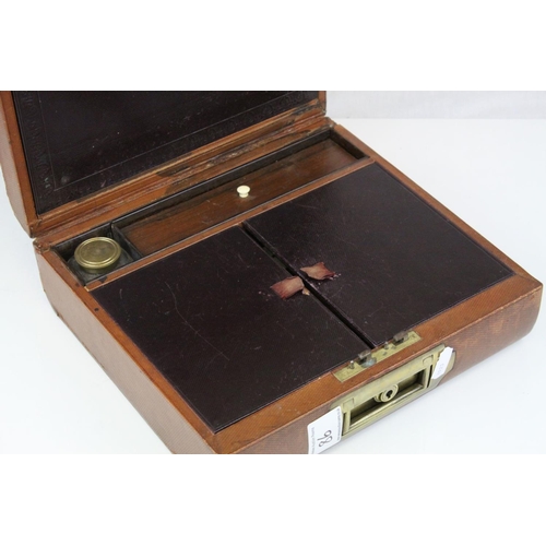 86 - Victorian Leather Covered Gentleman's Travelling Writing / Vanity Case, the hinged lid opening to re... 