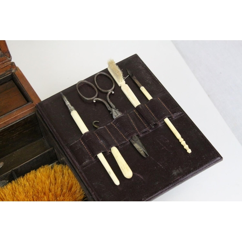 86 - Victorian Leather Covered Gentleman's Travelling Writing / Vanity Case, the hinged lid opening to re... 