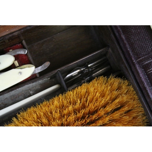 86 - Victorian Leather Covered Gentleman's Travelling Writing / Vanity Case, the hinged lid opening to re... 