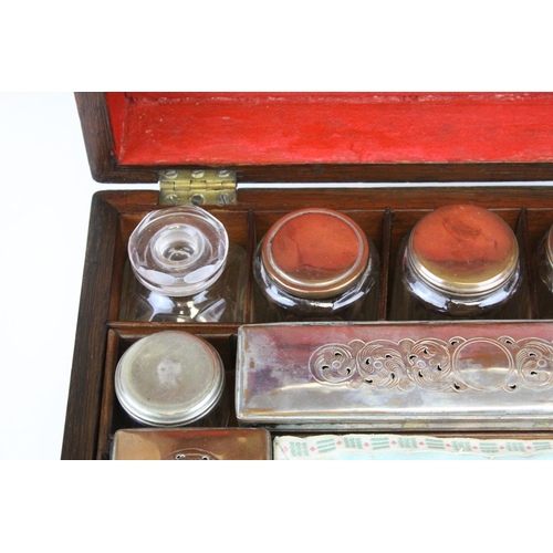 88 - Victorian Rosewood Dressing Box, the hinged lid opening to reveal Silver Plated Fittings, with key, ... 