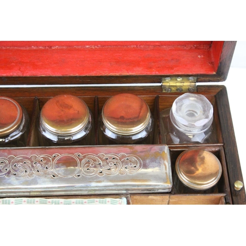 88 - Victorian Rosewood Dressing Box, the hinged lid opening to reveal Silver Plated Fittings, with key, ... 