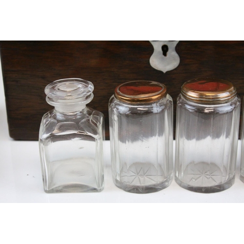 88 - Victorian Rosewood Dressing Box, the hinged lid opening to reveal Silver Plated Fittings, with key, ... 