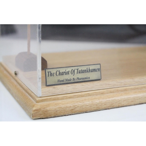 96 - Cased Model of Chariot of Tutankhamun made by Pharaonica, 33cms wide