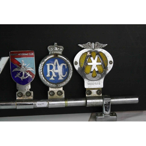 103 - Seven Vintage Car Badges mounted on Tubular Bracket including Singapore AA Badge, Notts & County... 