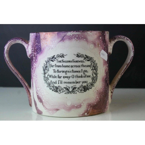 114 - 19th century Sunderland Pink Lustre Twin Handled Mug together with Three Sunderland Pink Lustre Jugs... 