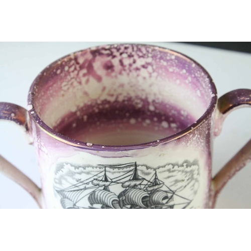 114 - 19th century Sunderland Pink Lustre Twin Handled Mug together with Three Sunderland Pink Lustre Jugs... 