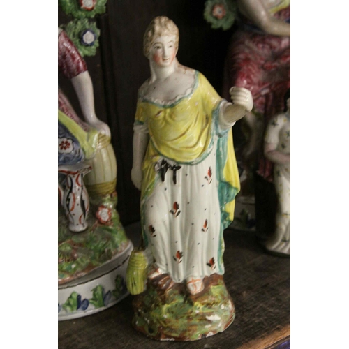 116 - Four Early 19th century Staffordshire Pearlware Figures stood before Bocage including Saint Peter to... 