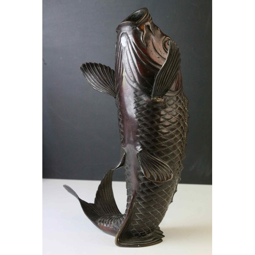 126 - Large Bronze Model of a Japanese Carp Fish, 31cms long together with a Japanese Bronze Plate decorat... 