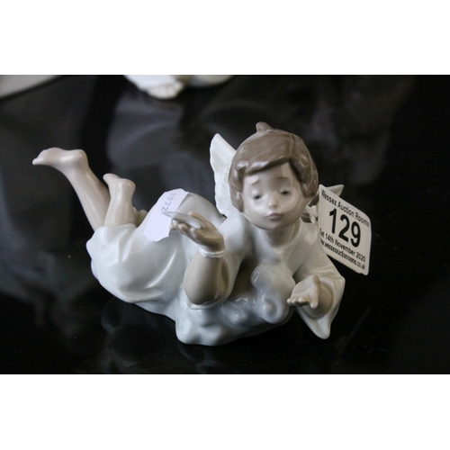 129 - Four Lladro Figures including ' Shh Quiet Puppy ' model no. 4522 and Three Angel Figures