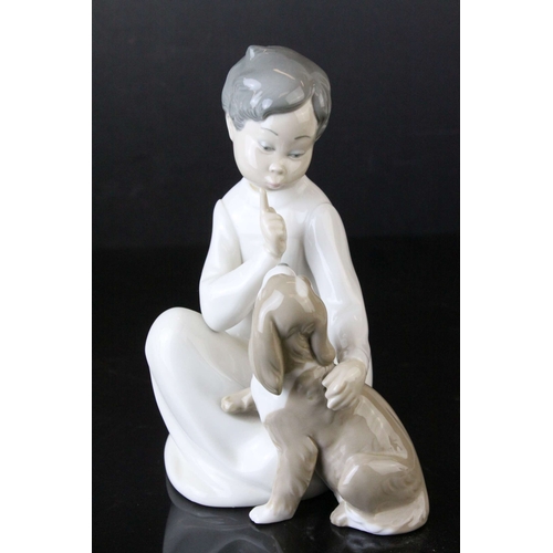 129 - Four Lladro Figures including ' Shh Quiet Puppy ' model no. 4522 and Three Angel Figures