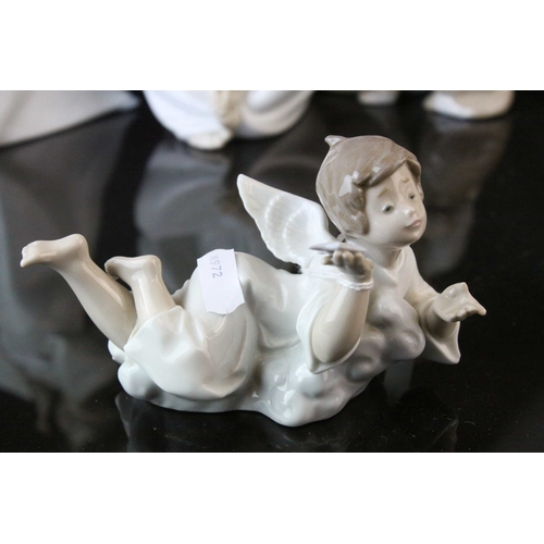 129 - Four Lladro Figures including ' Shh Quiet Puppy ' model no. 4522 and Three Angel Figures