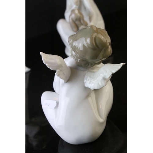 129 - Four Lladro Figures including ' Shh Quiet Puppy ' model no. 4522 and Three Angel Figures