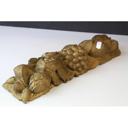 143 - Pair of Gilt Carved Wooden Plaques in the form of Fruits and Foliage, 41cms long