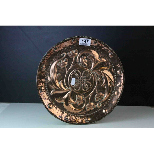 147 - Arts and Crafts John Pearson Copper Circular Tray, flower and foliage repousse decoration , marked w... 