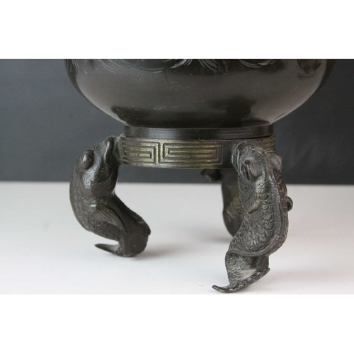 152 - Japanese Bronze, the body cast in relief with three clawed dragon and raised on three koi carp suppo... 