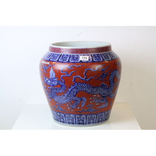 158 - Large Chinese Ceramic Jardiniere decorated with Five Toed Dragons on a Red Ground, 39cms high