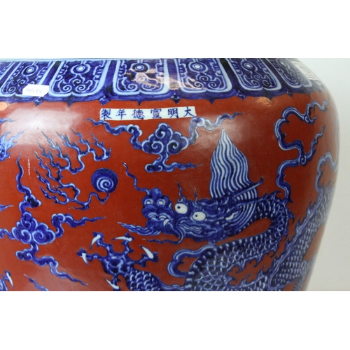 158 - Large Chinese Ceramic Jardiniere decorated with Five Toed Dragons on a Red Ground, 39cms high