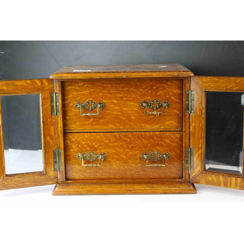 159 - Late 19th century Oak Table Top Cabinet, the two glazed doors opening to reveal drawers with brass h... 