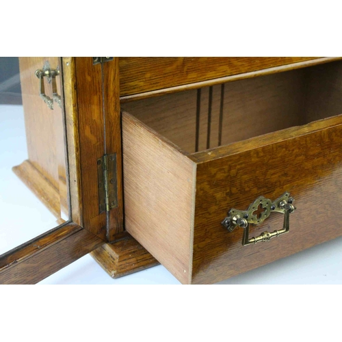 159 - Late 19th century Oak Table Top Cabinet, the two glazed doors opening to reveal drawers with brass h... 