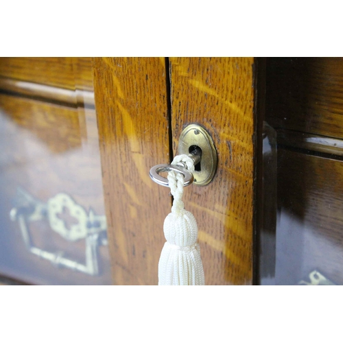 159 - Late 19th century Oak Table Top Cabinet, the two glazed doors opening to reveal drawers with brass h... 