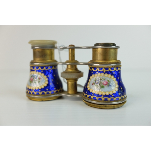 173 - Pair of 19th century Gilt Brass and Blue Guilloche Enamel Opera Glasses, decorated with panels of fl... 