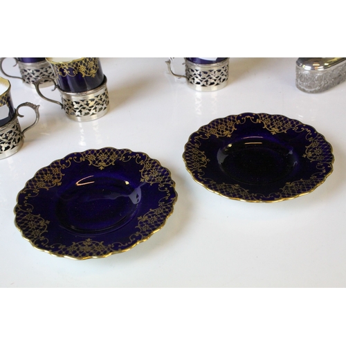 178 - Four Aynsley Cabinet Coffee Cans with Saucers, cobalt blue with gilt highlights, all the cans held w... 