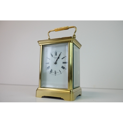 184 - Late 19th / Early 20th century Gilt Brass Carriage Clock, the white enamel face with Roman numerals ... 