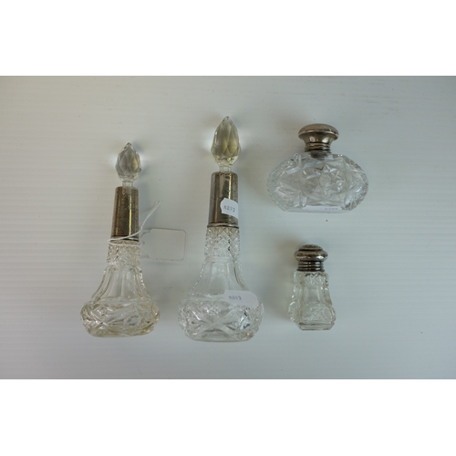 195 - Two Early 20th century Silver Collared and Glass Perfume Bottles together with Two Dressing Jars... 