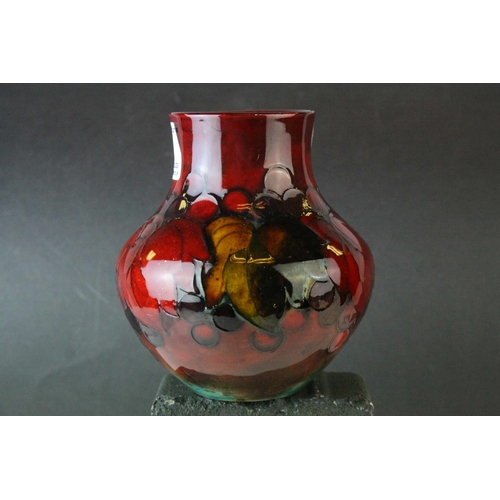 23 - Moorcroft Flambe Leaf and Berry Pattern Vase, 13cms high