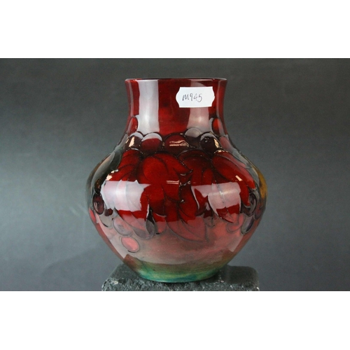 23 - Moorcroft Flambe Leaf and Berry Pattern Vase, 13cms high