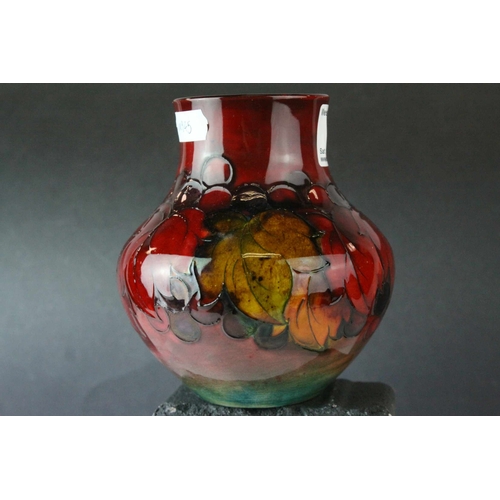 23 - Moorcroft Flambe Leaf and Berry Pattern Vase, 13cms high