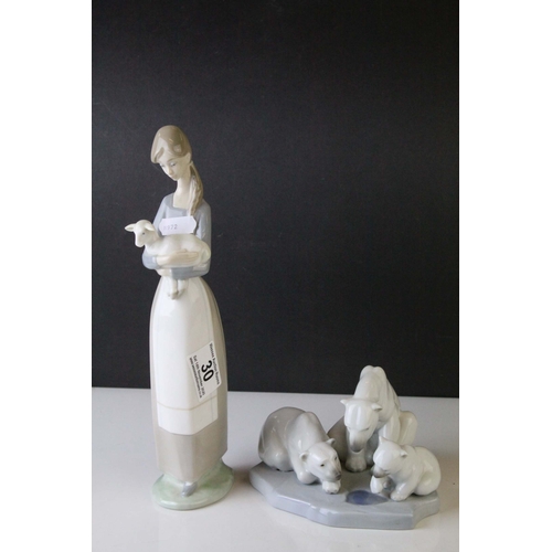 30 - Lladro Figure of a Girl holding a Kid Goat, 27cms high together with a Lladro Model of Polar Bears '... 