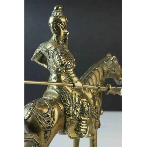 42 - Brass Model of a Chinese Guandi Warrior on Horseback with applied cabochon stones, 23cms high