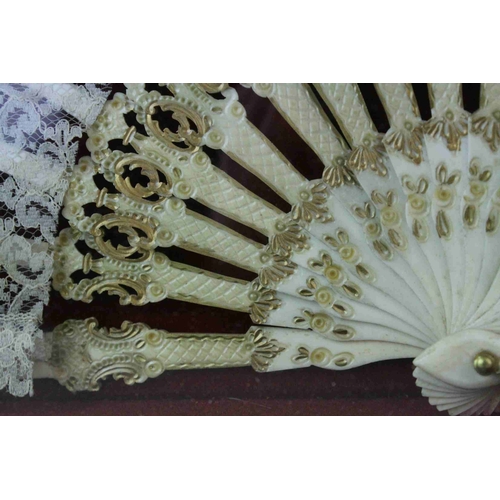 54 - Late 19th / Early 20th century French Needle Lace Fan mounted  on ivory sticks with gilded decoratio... 