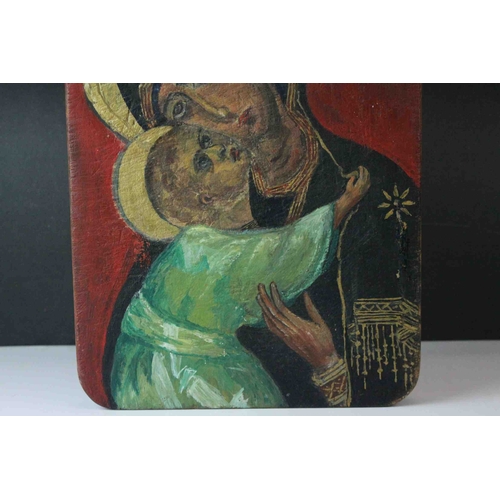 57 - Wooden Painted Icon depicting Madonna and Child, marked to verso Ymirehin, 31cms x 22cms