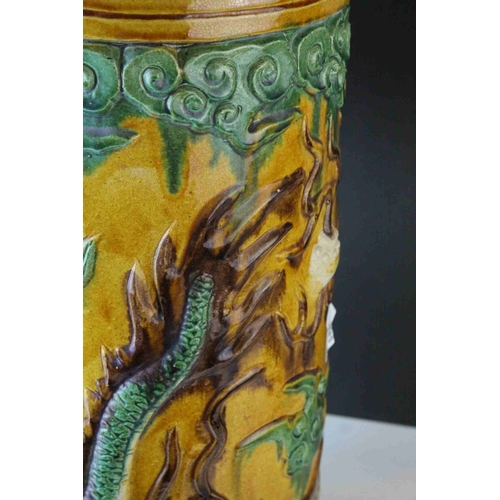 65 - 20th century Chinese Sancai Pottery Stickstand decorated with a Dragon, 48cms high